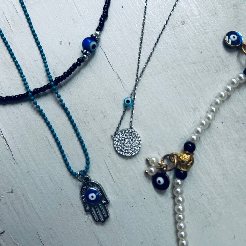 Evil eye bracelet, choker necklaces, and double string neckla with hamsa hand
